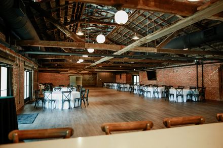 Open floor of The Hall with tables